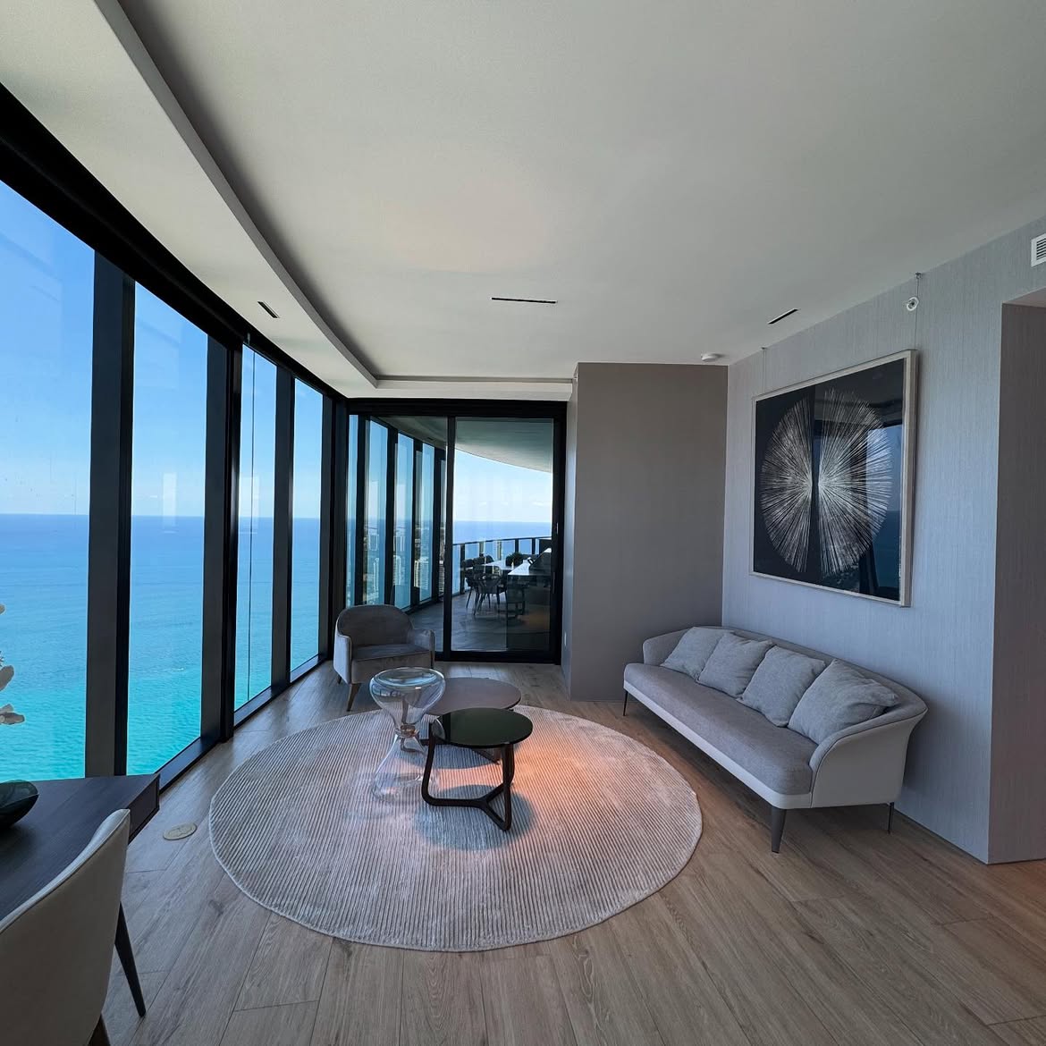 Luxury Miami living room with textured wallcovering and ocean view