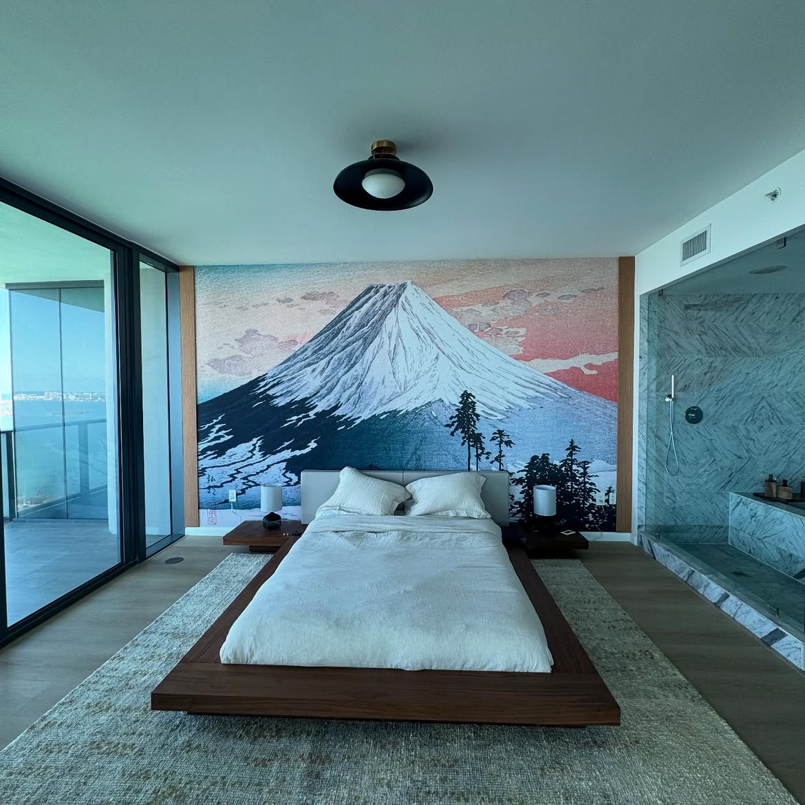 Custom Mount Fuji mural installed behind a luxury bedroom