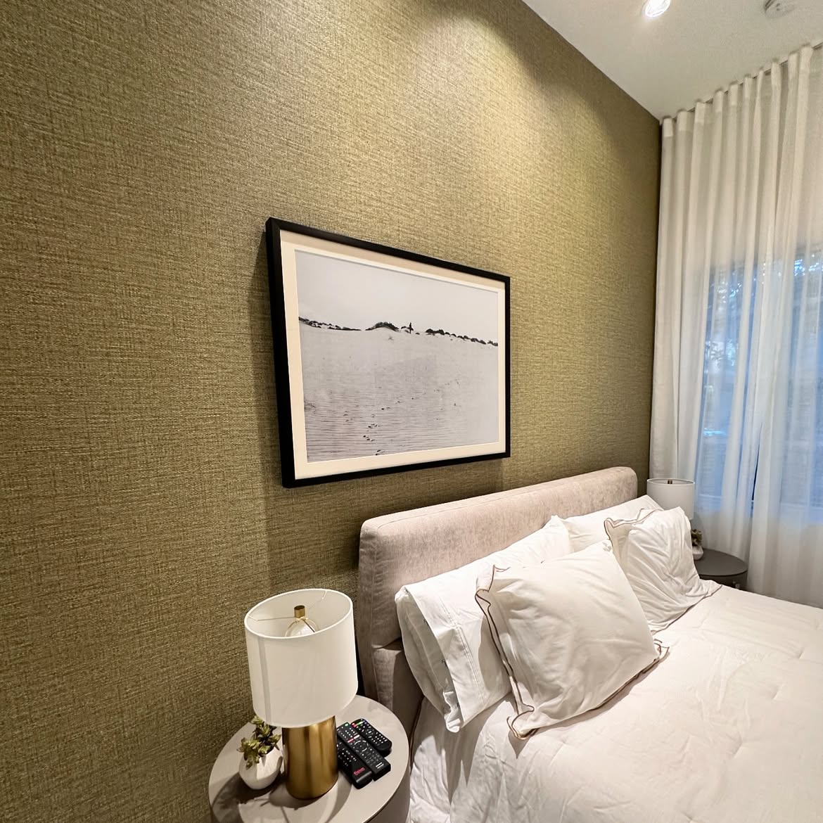 Golden Beach bedroom with textured olive wallcovering